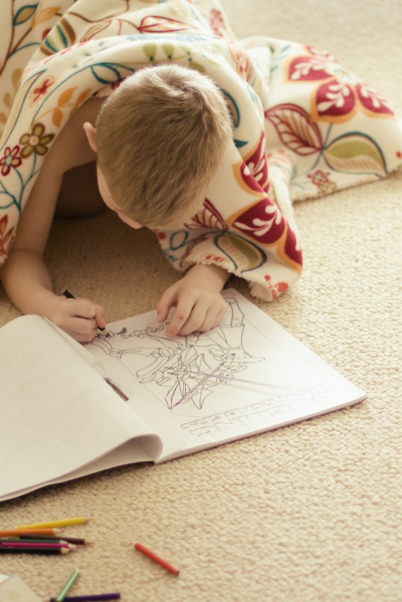 connor colored in his star wars book. he didn't know i was there.